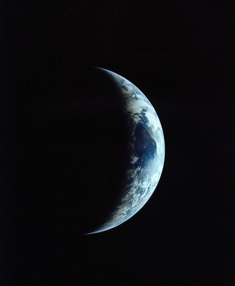 Apollo 11 returning to home planet Earth.jpg